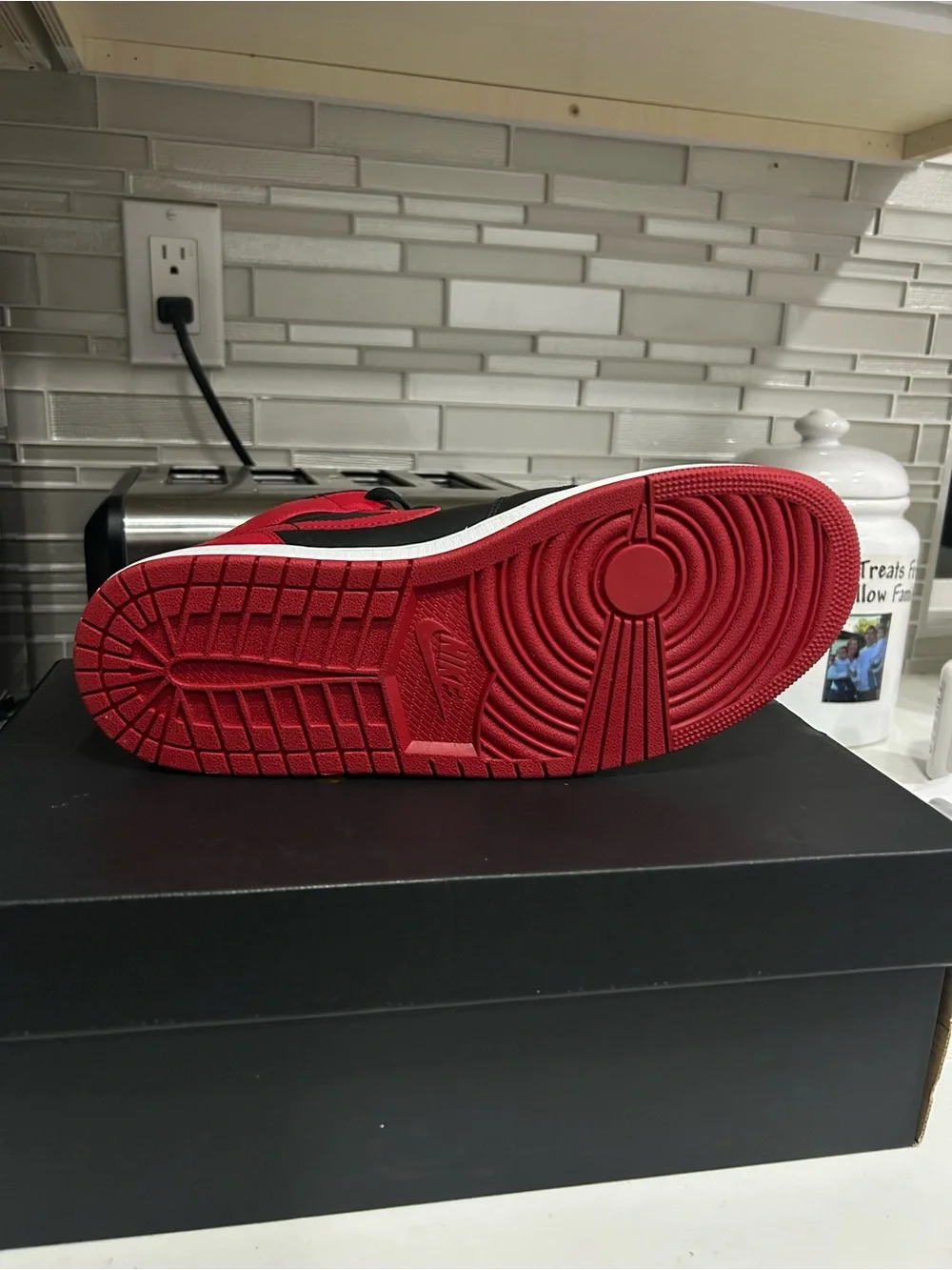Nike Air Jordan 1 Mid Black and Red Sneakers